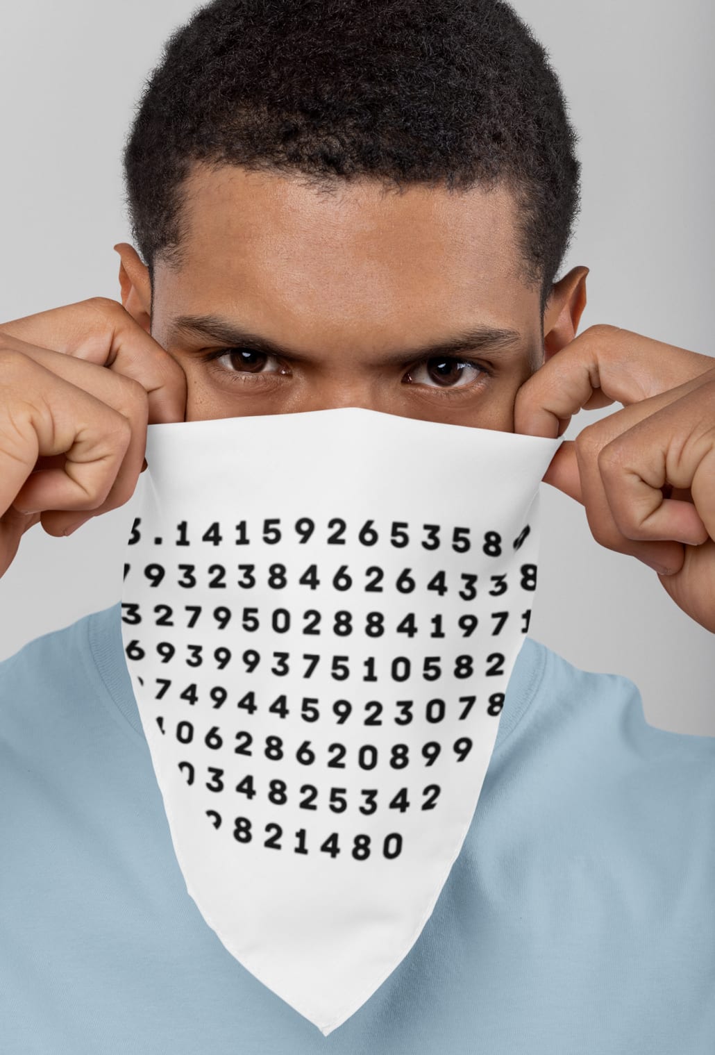 man covering his face with a bandana